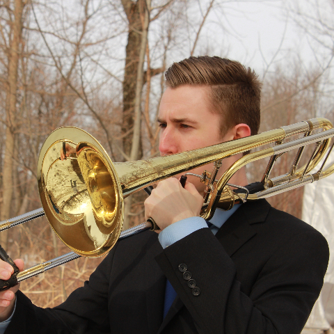 Hayden playing the trombone