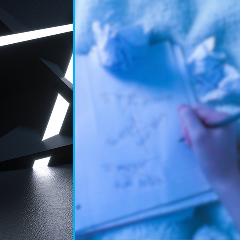 Cloudy blue image of someone writing in a notebook.