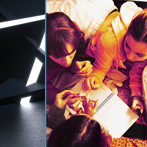 Birds-eye view of three characters around a notebook. 