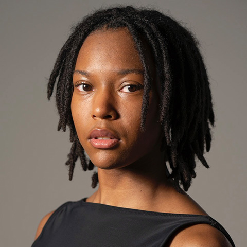 CiCi Kai headshot; wearing a blank top