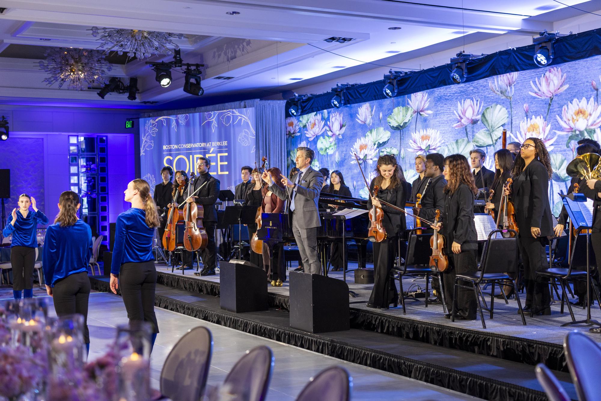 Small orchestra on stage at the 2026 Soiree.